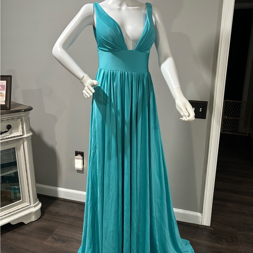 Bridesmaids maid dress in teal/ sea foam green.